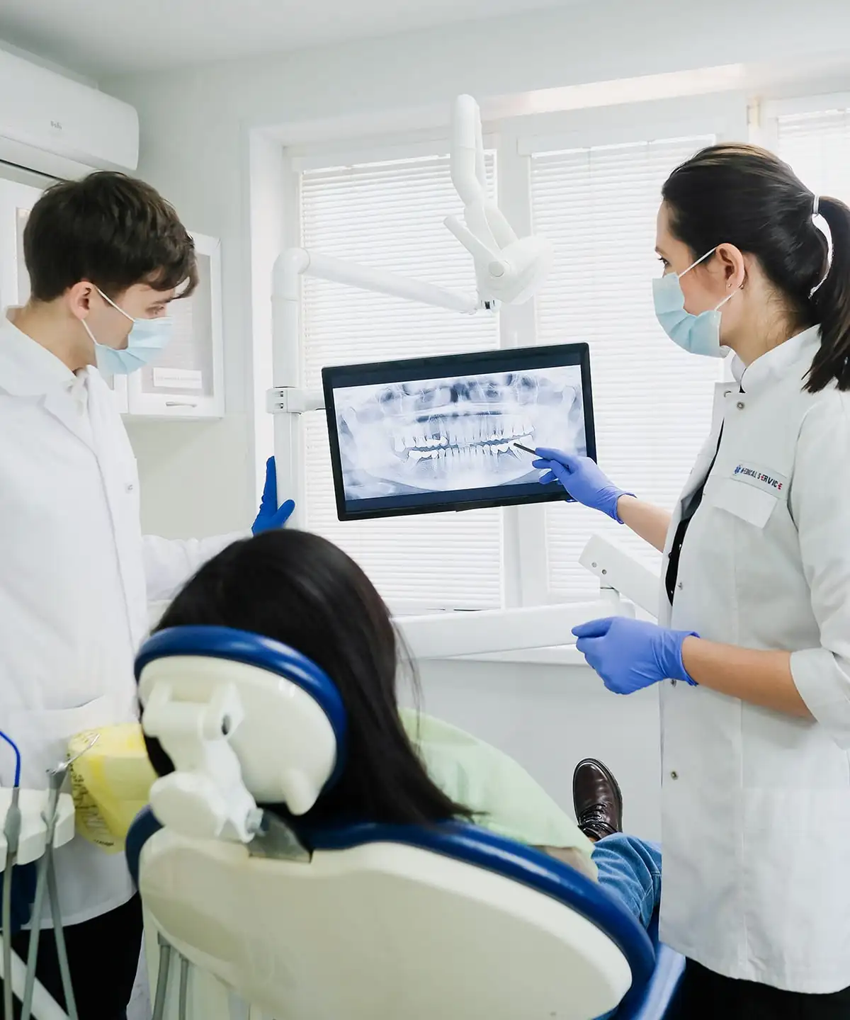 Dentist explaining treatment to a patient